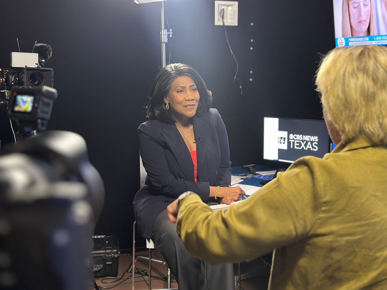 Photo of Robbie Owens interviewing Olive Talley